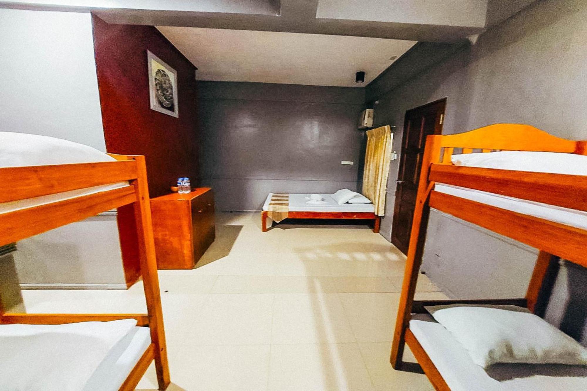 Mbg Travellers Inn Powered By Cocotel Puerto Princesa Rom bilde