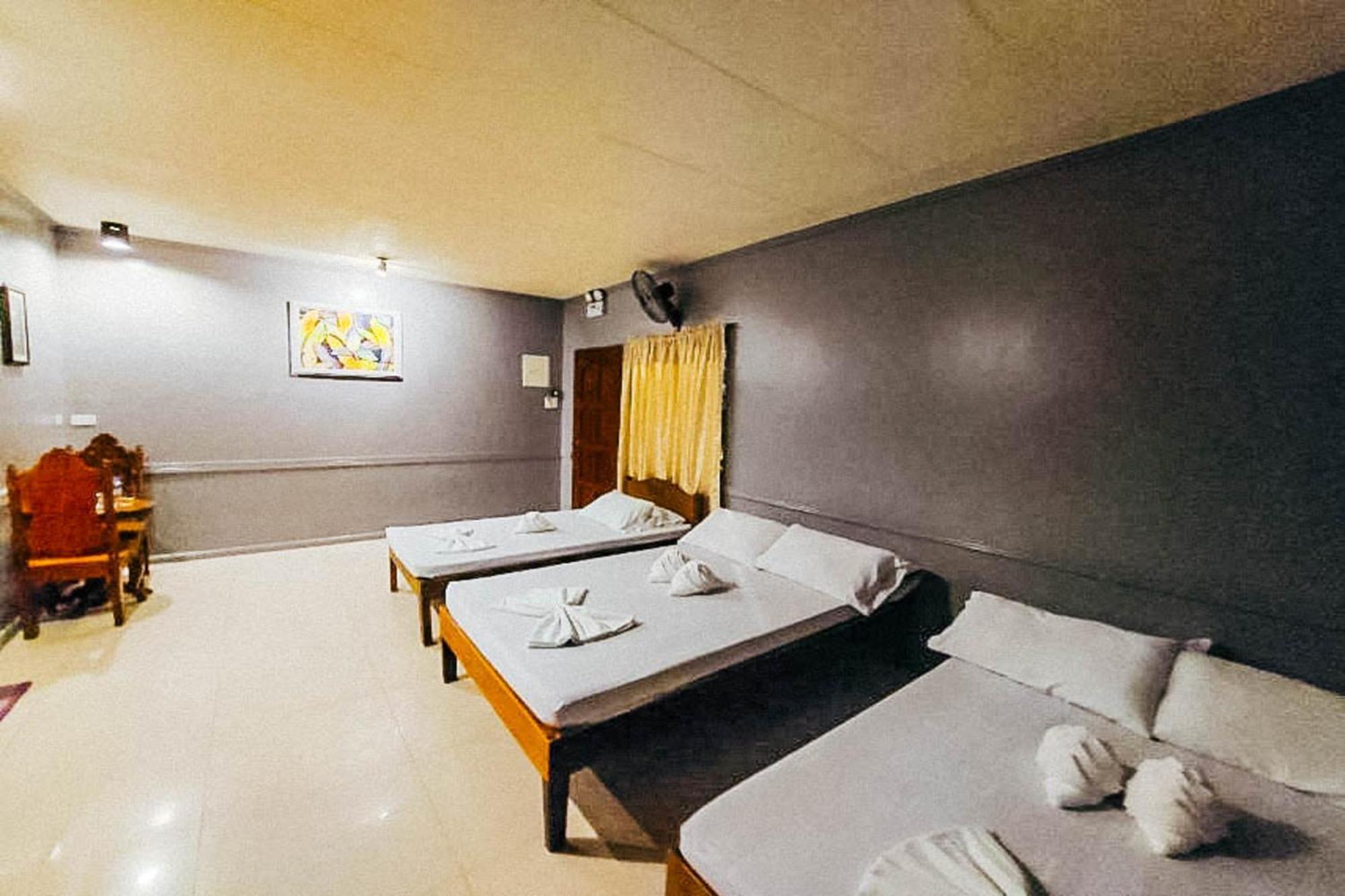 Mbg Travellers Inn Powered By Cocotel Puerto Princesa Rom bilde