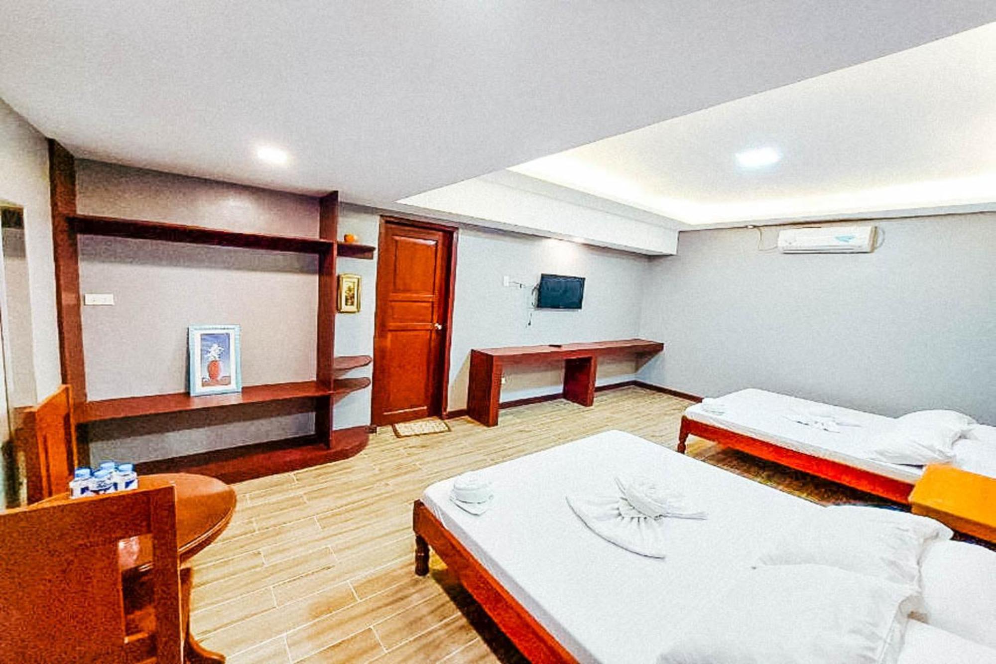 Mbg Travellers Inn Powered By Cocotel Puerto Princesa Rom bilde