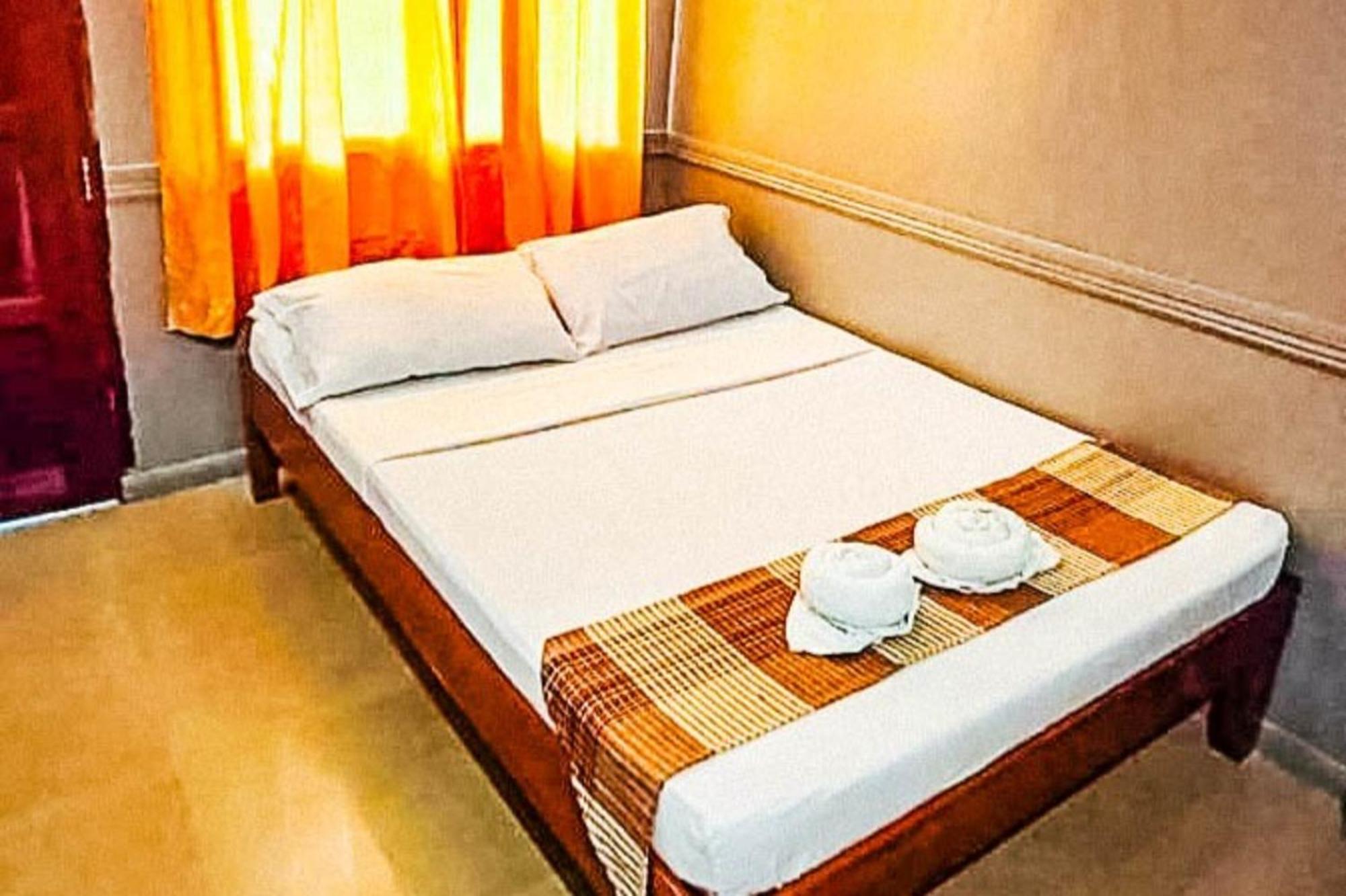 Mbg Travellers Inn Powered By Cocotel Puerto Princesa Rom bilde