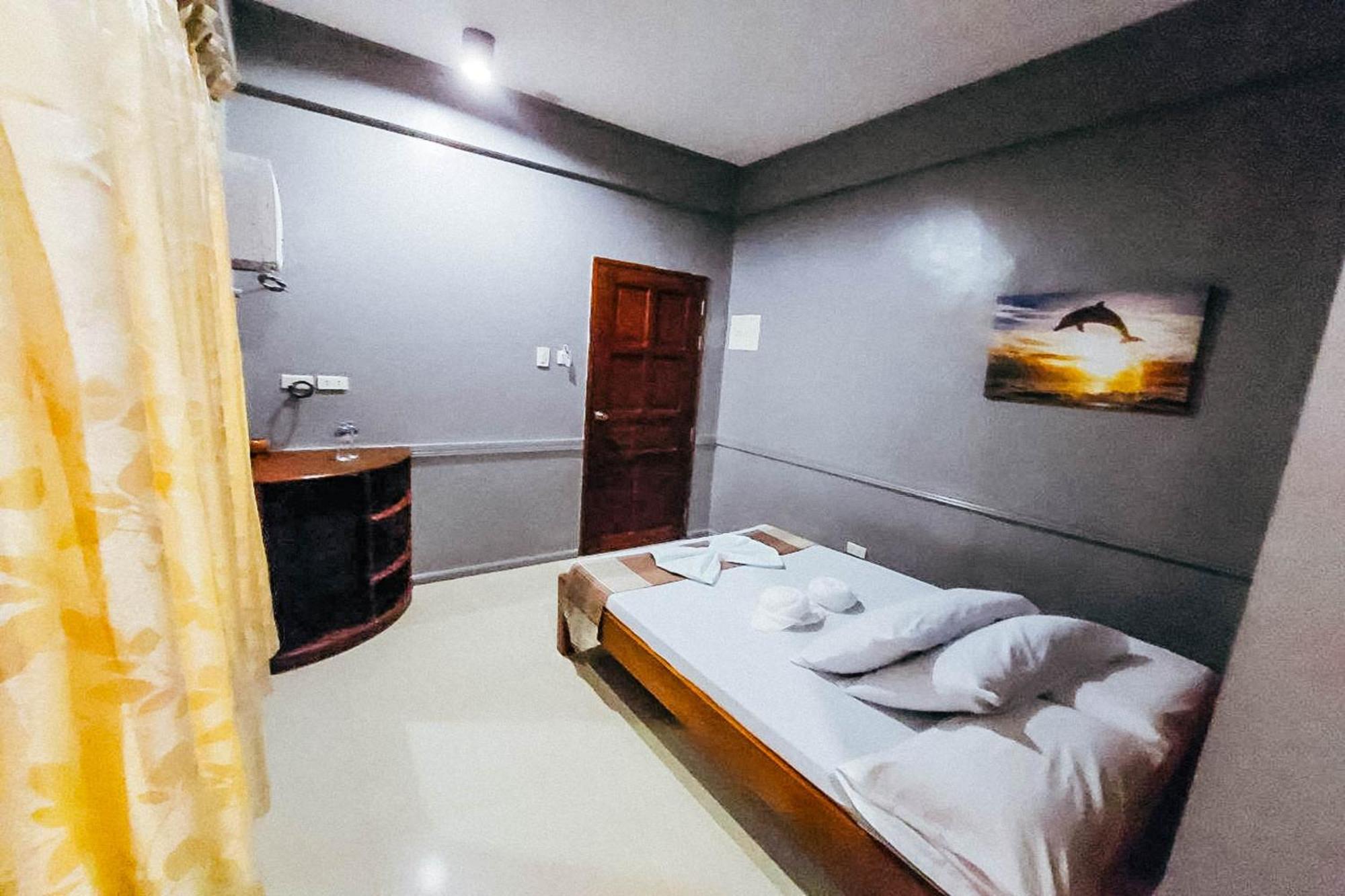 Mbg Travellers Inn Powered By Cocotel Puerto Princesa Rom bilde