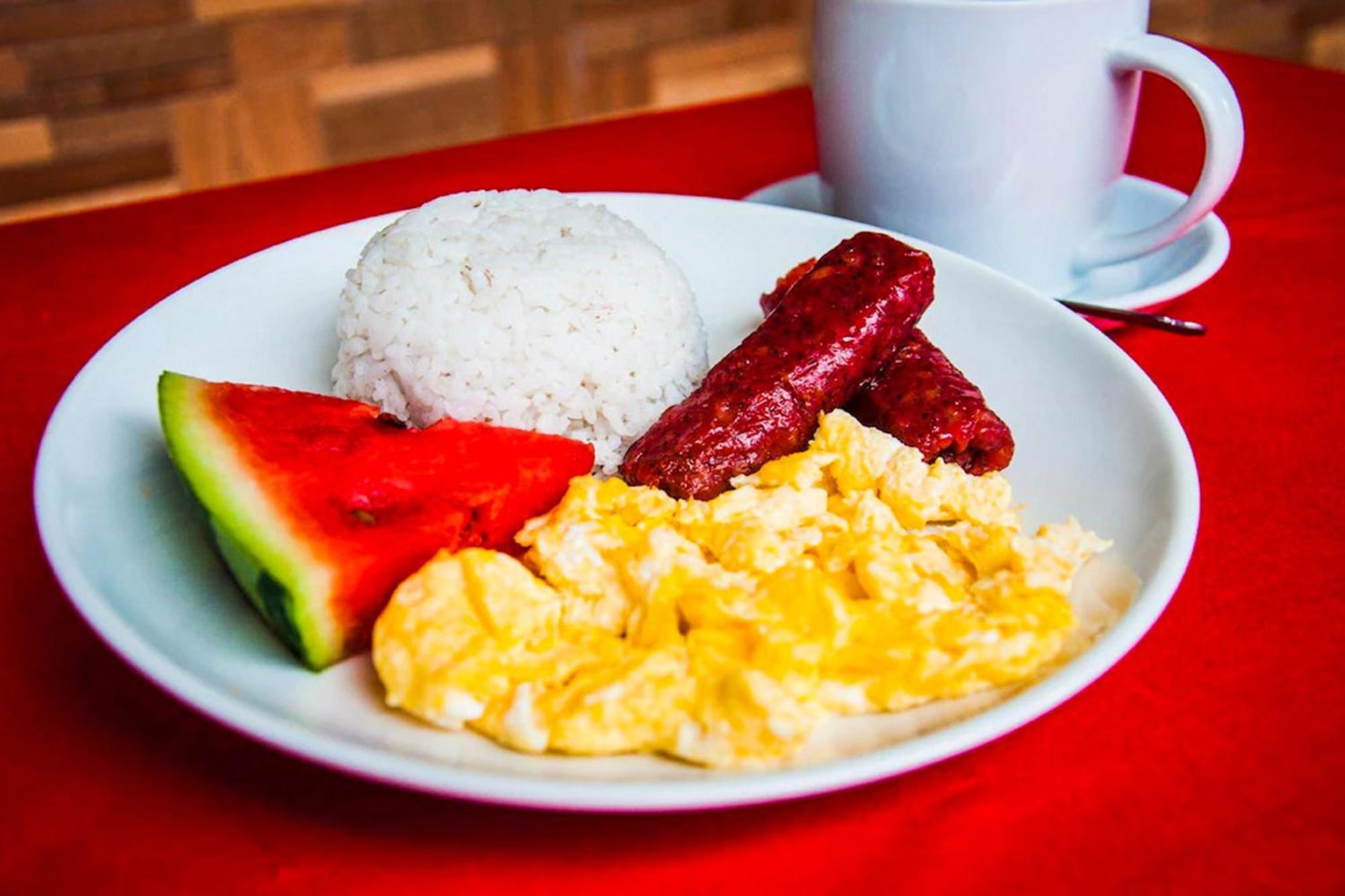 Mbg Travellers Inn Powered By Cocotel Puerto Princesa Eksteriør bilde