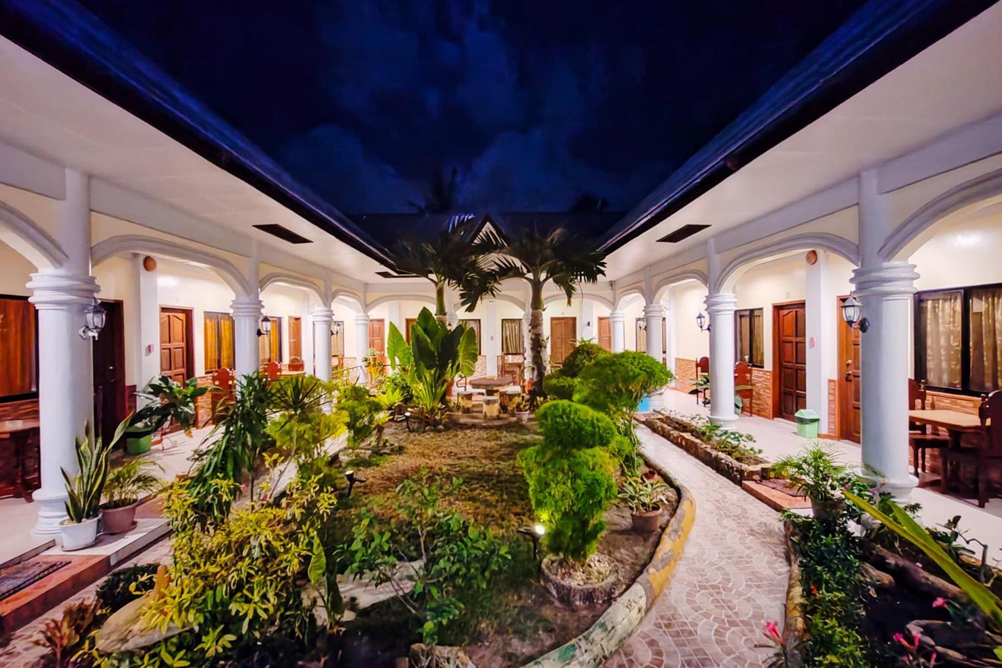 Mbg Travellers Inn Powered By Cocotel Puerto Princesa Eksteriør bilde