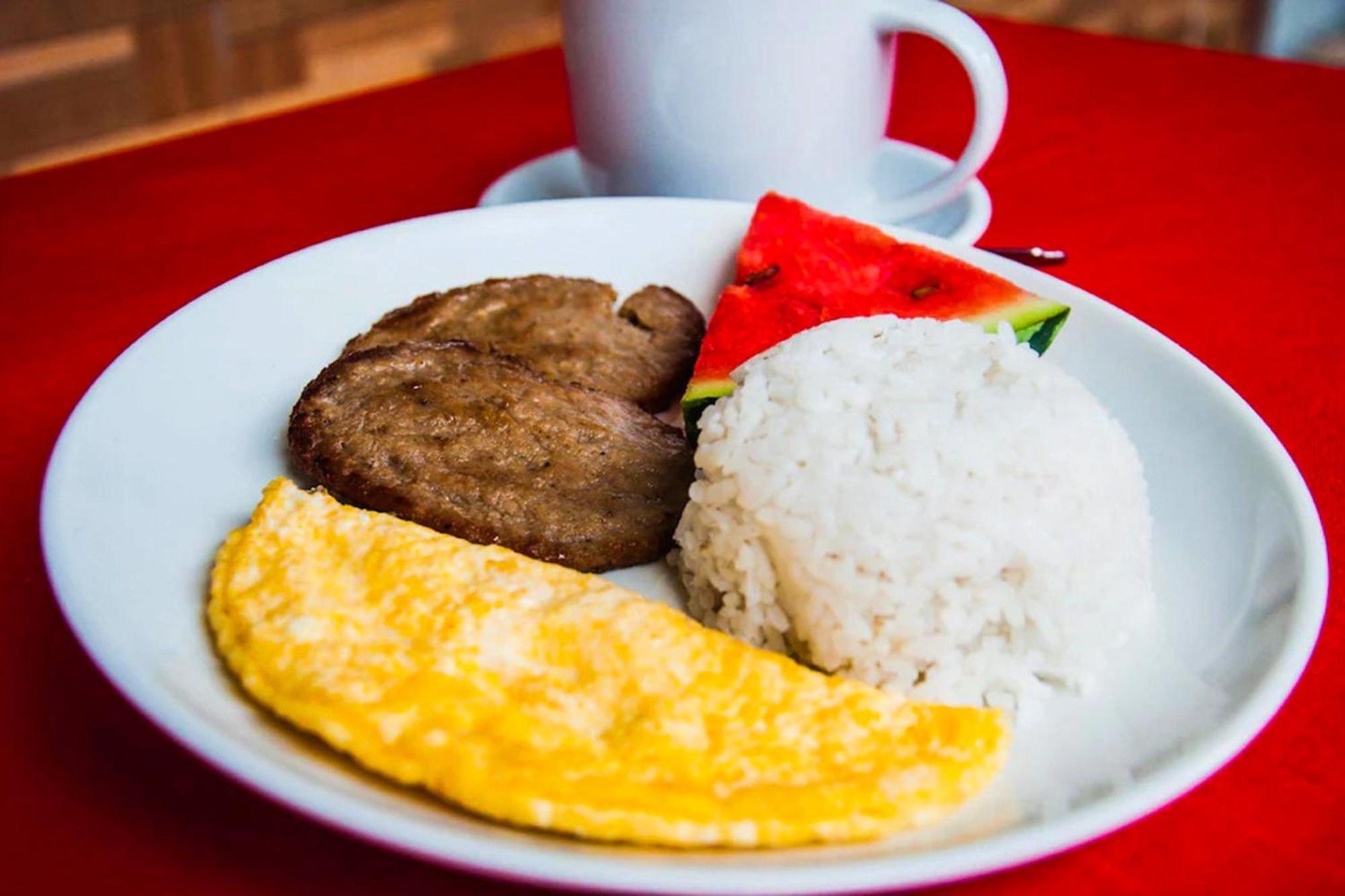 Mbg Travellers Inn Powered By Cocotel Puerto Princesa Eksteriør bilde