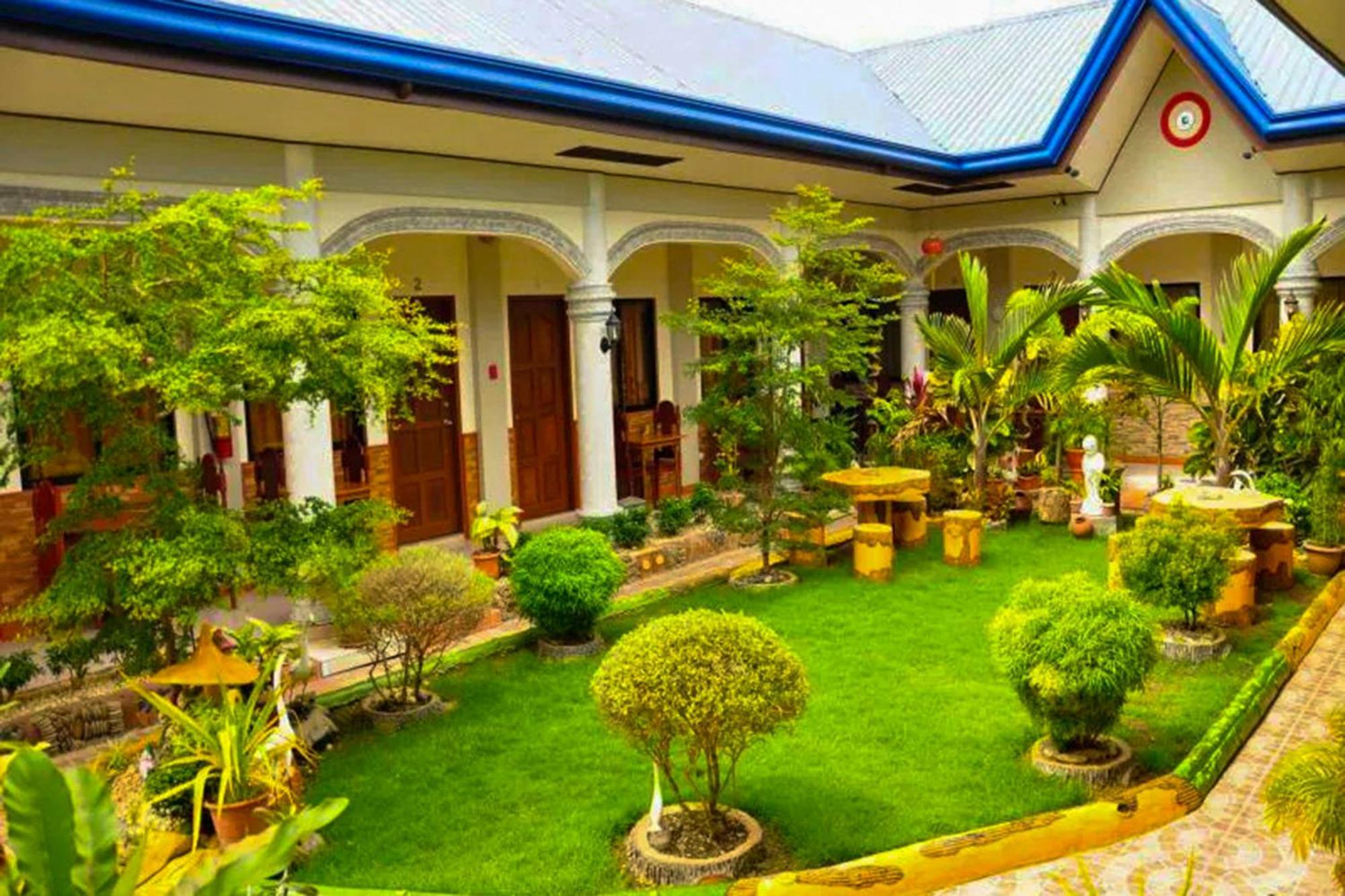 Mbg Travellers Inn Powered By Cocotel Puerto Princesa Eksteriør bilde